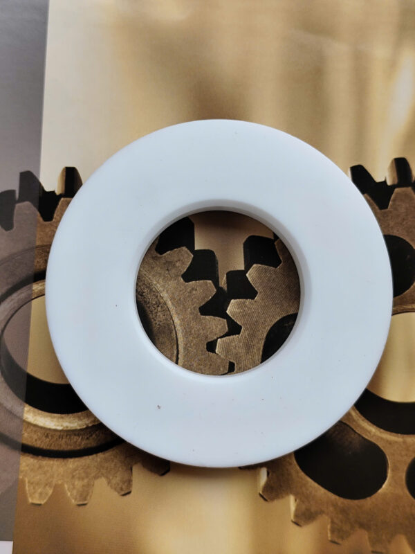Đế bi ptfe